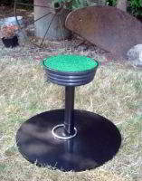 A Portable Falcon Block Perch with 7" diameter top.  Perch must ship by itself.