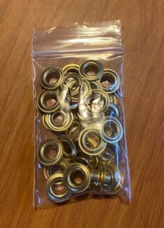 Grommets. Size "0", 1/4" diameter hole 25 per pack