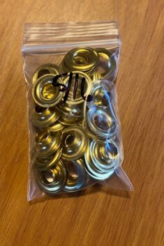 Grommets. size 1" 5/16 diameter hole. 25 sets per pack