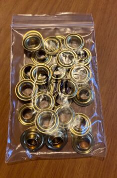 Grommets. size 3" 7/16 diameter hole. 25 sets per pack