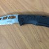 A - Gerber E-Z Out small game knife.