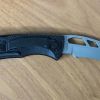 A - Gerber E-Z Out small game knife.