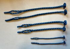EIGHT STRAND SQUARE BRAIDED JESSES IN THREE SIZES black and blue color with flat Sennit Rose knot