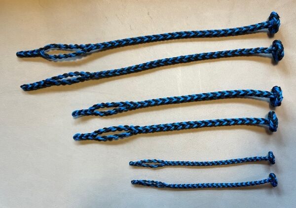 EIGHT STRAND SQUARE BRAIDED JESSES IN THREE SIZES black and blue color with flat Sennit Rose knot