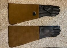 Medium weight Arm Length cowhide raptor and animal handling gloves.