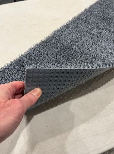 Long leaf artificial Astro turf. 1ft x 3ft pieces ¾ inch thick. – color blue gray. $6.85 per square foot.